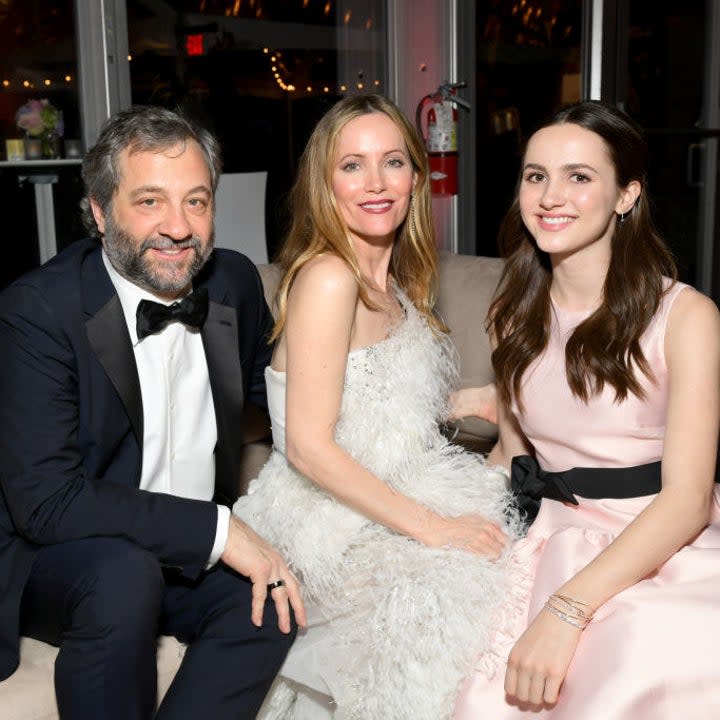 maude with her parents at an event