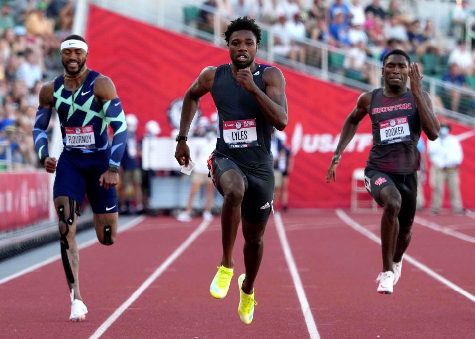 Noah Lyles (center) runs in a 200m semifinal on Saturday, June 26, 2021, during the US Olympic Team Trials at Hayward Field in Eugene, Oregon.