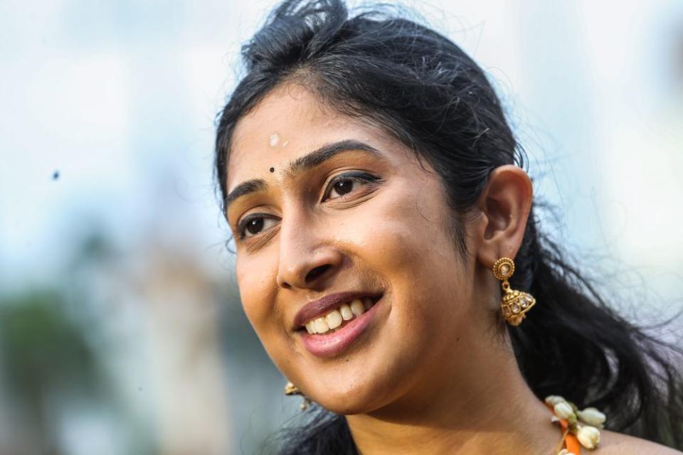 Laveena Jayabarathi, 25, speaks to Malay Mail during an interview at Batu Caves on Thaipusam January 18, 2022. — Picture by Hari Anggara