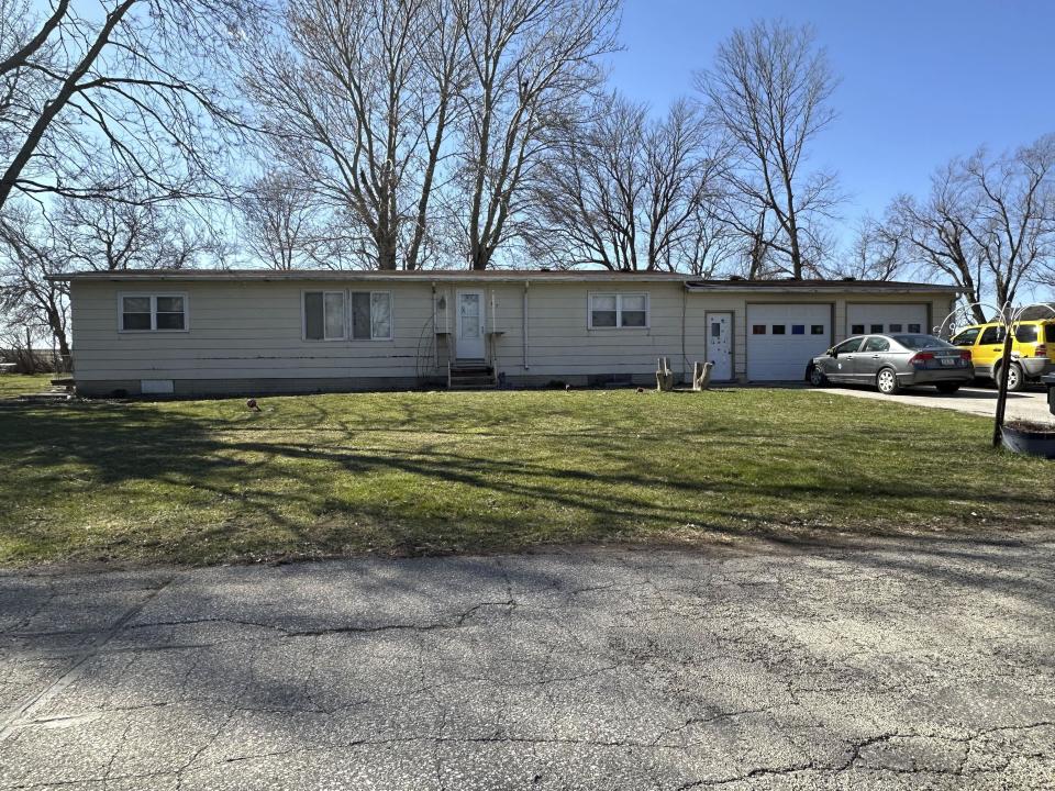 This photo taken on Tuesday, March 19, 2024, shows a house in Zearing, Iowa, where four members of a family were accused of abducting and badly abusing another relative. The 18-year-old victim suffered a brain bleed and other injuries. Court documents say the teen weighed just 70 pounds (32 kilograms) when he showed up at a hospital. (AP Photo/Hannah Fingerhut)