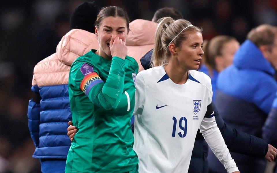 England's Rachel Daly consoles Mary Earps after the match