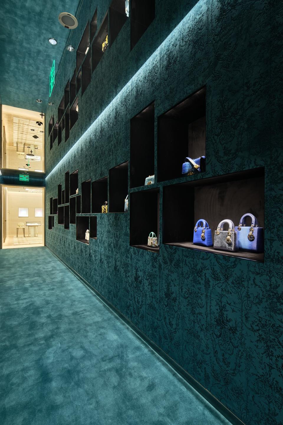 A corridor lined with handbags in exotic skins on the third floor of the Dior Plaza 66 store.