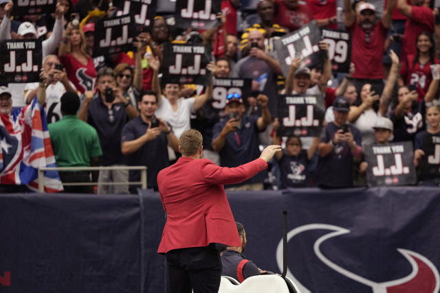 JJ Watt with Baby Son at Houston Texans Ring of Honor Induction