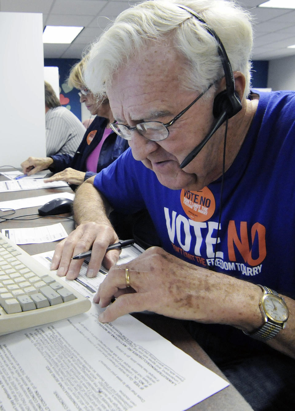 In this Oct. 23, 2012, photo, Joe Norquist, a retired doctor, calls fellow senior citizens from a Shoreview, Minn, phone bank to urge them to vote against a proposed constitutional ban on gay marriage on Minnesota's statewide ballot next month. The phone bank was sponsored by Minnesotans United for All Families, the campaign trying to defeat the amendment. (AP Photo/Jim Mone)