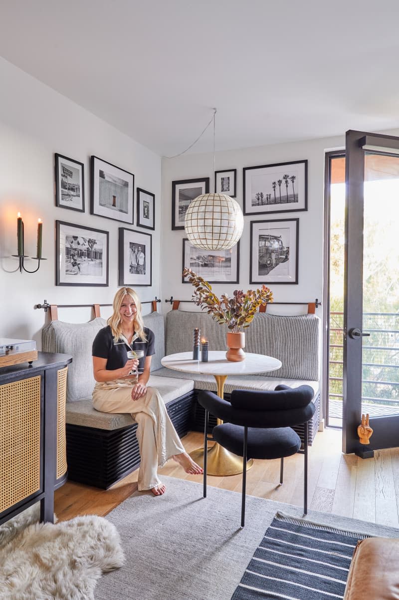 Dweller enjoying a cocktail in breakfast nook.