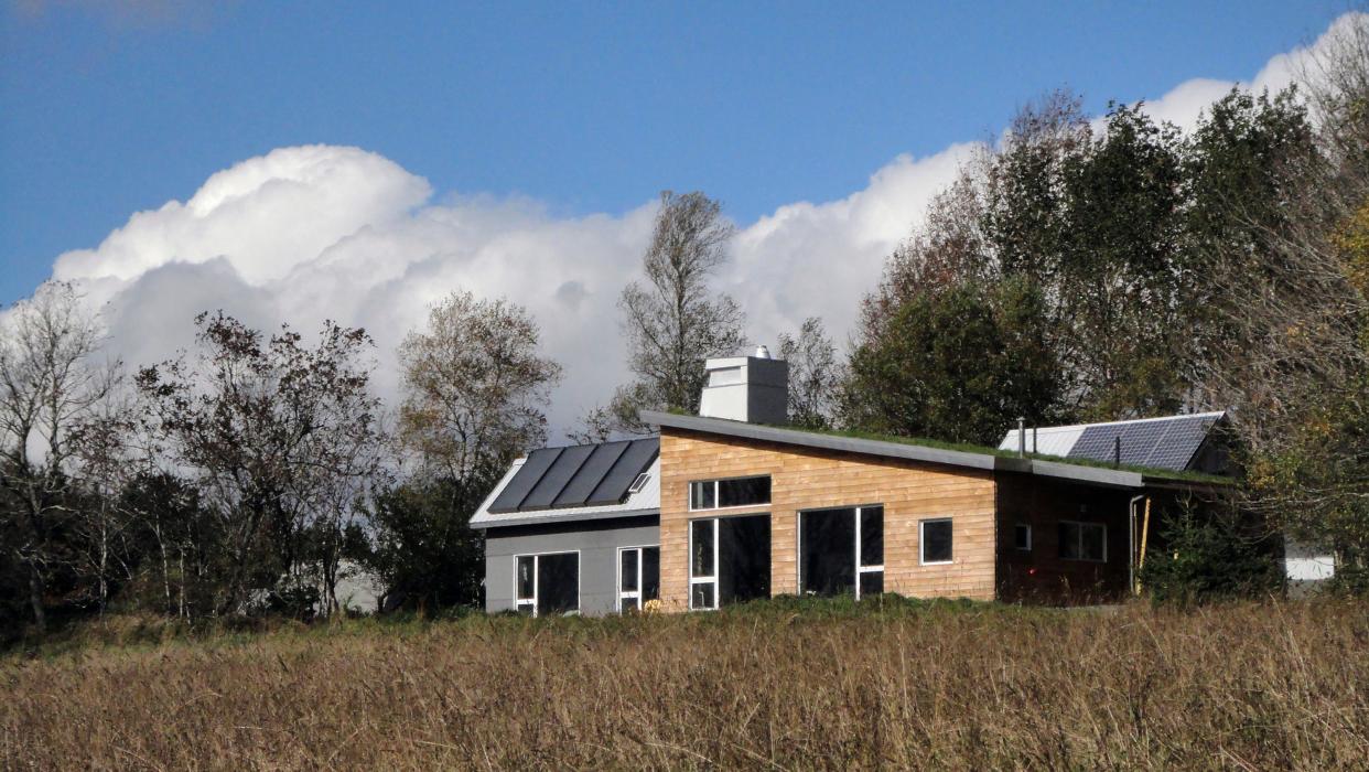 The Solterre Concept House in Nova Scotia, an off-grid home featured in the book "Downsize, Living Large In a Small House" by Sheri Koones.