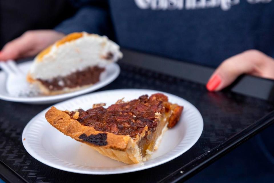 Slices of pecan and chocolate pies at the Apex Lions Club restaurant during the State Fair in Raleigh Monday, Oct. 16, 2023. The Apex Lions Club has been serving food at the fair’s restaurant row since 1943. The restaurant row building will be replaced with an events center next year.