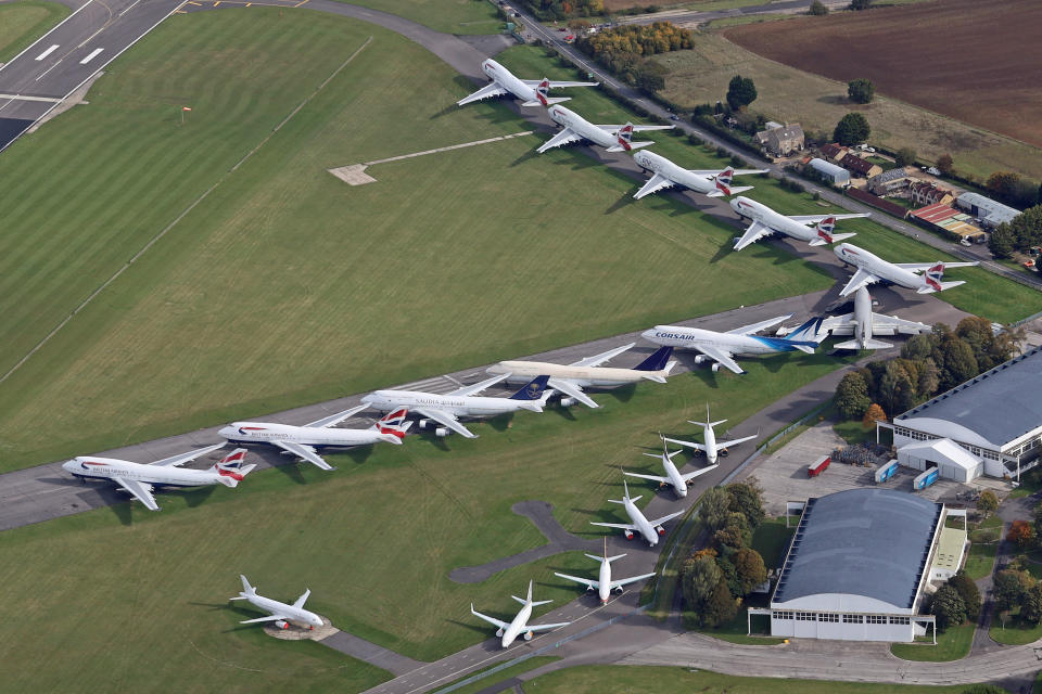 Aerial view of the runway at Kemble airfield where an airplane salvage company has a stock of many craft rendered unviable by the the consequences of Covid 19, October 12 2020. The tarmac is hosting 16 'Jumbos' (Boeing 747s) including the last of BA's fleet G-CIVB which landed here last week.