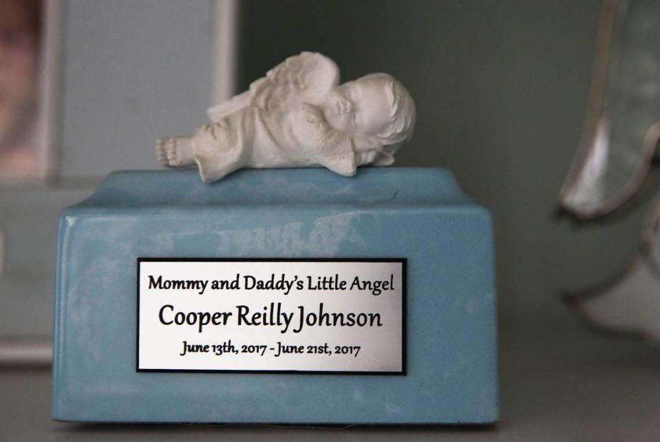 A porcelain sleeping cherub — inscription: ‘Mommy and Daddy’s Little Angel’ — is a constant reminder of Cooper.