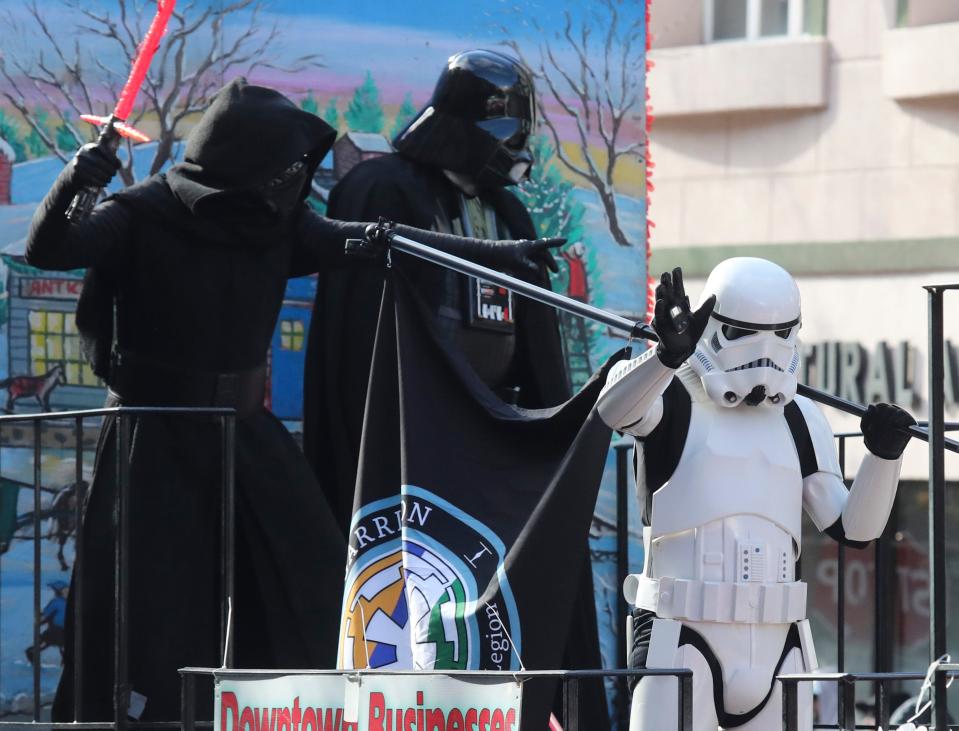 Star Wars characters look out over Market Street during the 57th Annual Wilmington Jaycees Christmas Parade Saturday, Nov. 27, 2021.