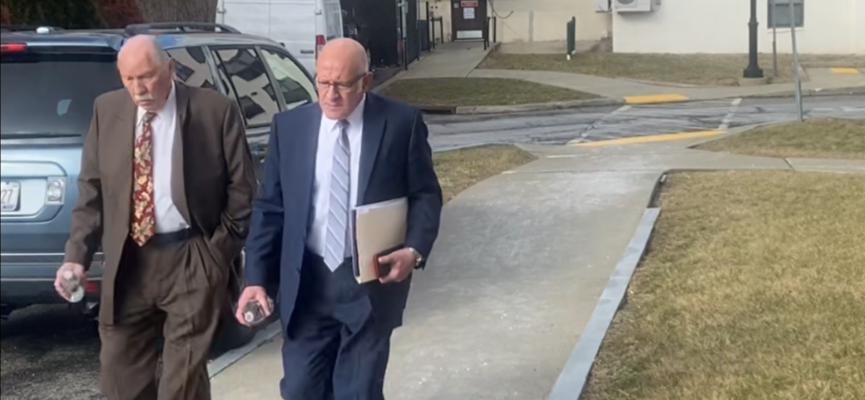 Retired Putnam County sheriff's investigator William Quick, left returns to court with Putnam District Attorney Robert Tendy Jan. 31, 2023, during Quick's testimony in the murder retrial of Andrew Krivak.