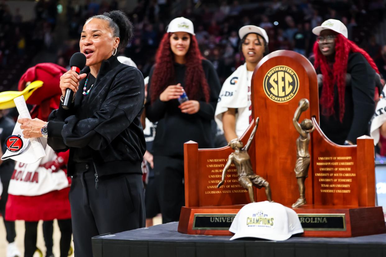 South Carolina coach Dawn Staley speaks to the crowd after the Gamecocks clinched a share of the SEC regular-season title on Feb. 22, 2024.