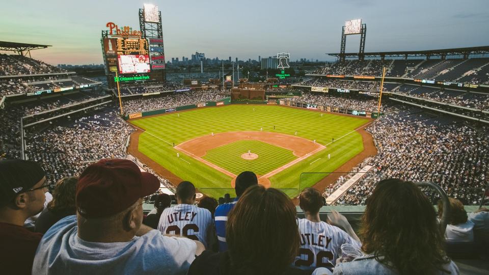 Fans in top row are part of the 29,183 baseball fans at Citizens Bank Park, Philadelphia, PA, watching the Philadelphia Phillies beat the Milwaukee Brewers by a score of 8 to 6 on May 14, 2007.