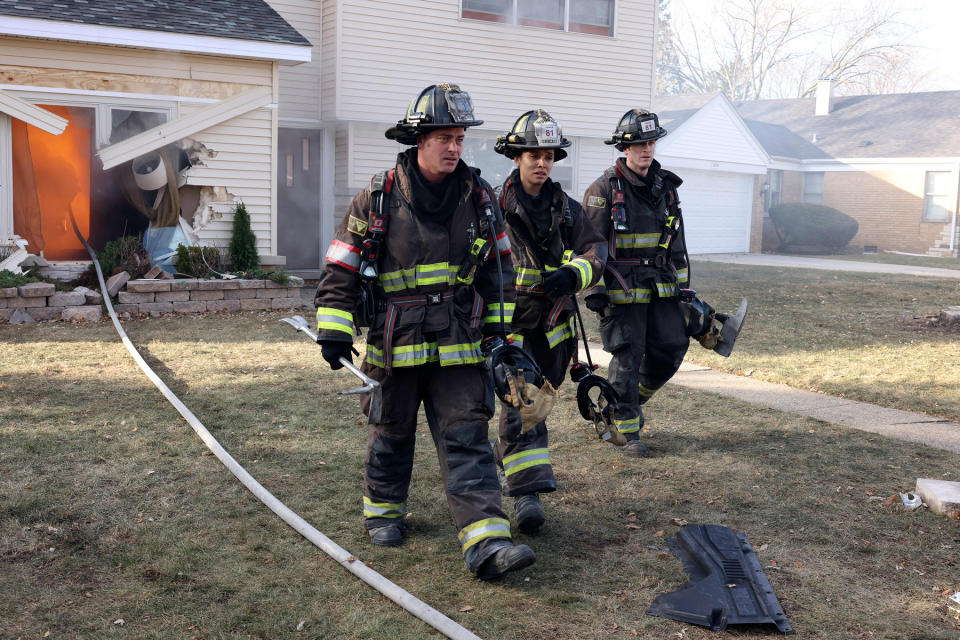 Taylor Kinney as Kelly Severide, Miranda Rae Mayo as Stella Kidd, Jake Lockett as Carver in 'Chicago Fire.'