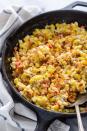 <p>This delightful take on Southern creamed corn involves cream cheese, bacon, and peppers. It's crunchy, creamy, and all-around special.</p><p><a href="https://www.thepioneerwoman.com/food-cooking/recipes/a104938/cream-cheese-and-bacon-corn/" rel="nofollow noopener" target="_blank" data-ylk="slk:Get the recipe.;elm:context_link;itc:0;sec:content-canvas" class="link "><strong>Get the recipe.</strong></a></p>