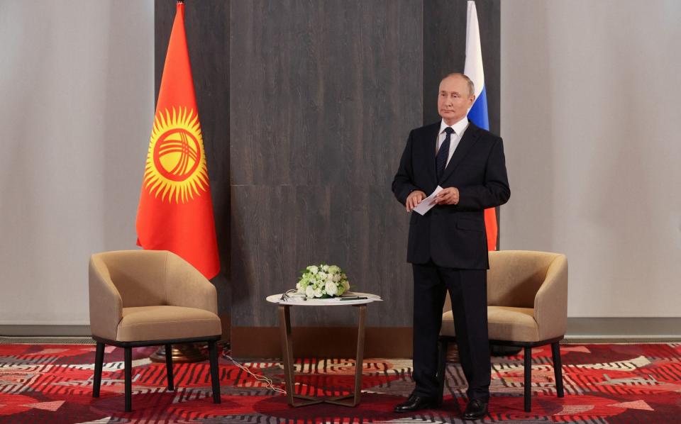 Russian President Vladimir Putin waits before a meeting with Kyrgyz President Sadyr Japarov on the sidelines of the Shanghai Cooperation Organization (SCO) summit in Samarkand, Uzbekistan September 15, 2022. - SPUTNIK/REUTERS