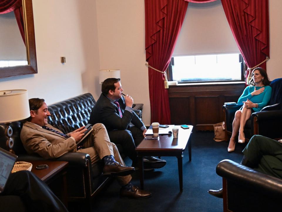 Hanlon (far left) during a staff meeting in Mace's DC office on April 25, 2023.