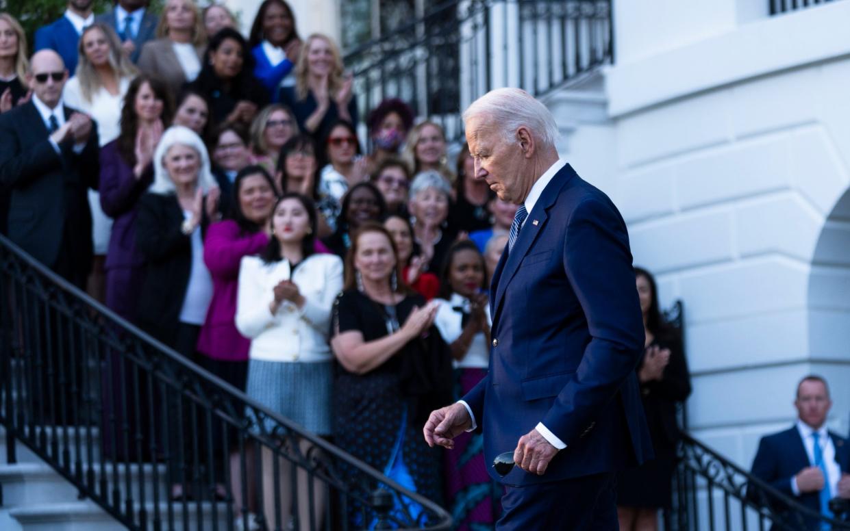 President Joe Biden walks across South Lawn of the White House on Thursday