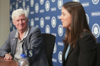 Catie Griggs is introduced as the Seattle Mariners' new president of business operations by John Stanton, the team's chairman and managing partner, during a baseball press conference in Seattle on Wednesday, July 28, 2021, (AP Photo/Jason Redmond)