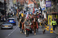 <p>Historical re-enactors make their way through Battle, England, at the end of a march from York ahead of a Battle of Hastings re-enactment on Oct. 14, 2016. (Photo: Carl Court/Getty Images)</p>