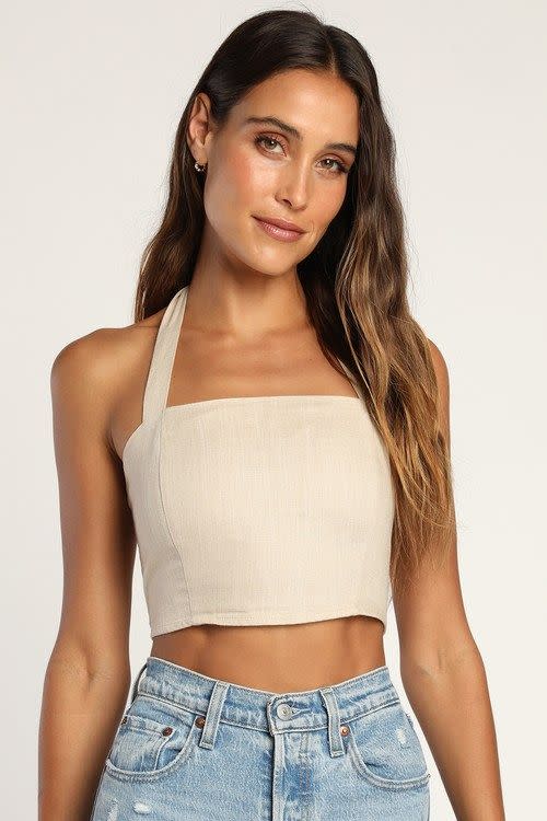 <p><a href="https://go.redirectingat.com?id=74968X1596630&url=https%3A%2F%2Fwww.lulus.com%2Fproducts%2Fdouble-digits-beige-linen-halter-crop-top%2F1034202.html&sref=https%3A%2F%2F" rel="nofollow noopener" target="_blank" data-ylk="slk:Shop Now;elm:context_link;itc:0;sec:content-canvas" class="link ">Shop Now</a></p><p>Double Digits Beige Linen Halter Crop Top</p><p>$39.00</p><p>lulus.com</p>