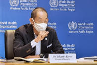 In this handout photo provided by the World Health Organization Regional Office for the Western Pacific, WHO Regional Director for the Western Pacific Dr. Takeshi Kasai, speaks in Manila, Philippines on Thursday, Nov. 11, 2021. World Health Organization officials in the Western Pacific Friday, Dec. 3, 2021, say border closures adopted by some countries may buy time to deal with the omicron coronavirus variant, but measures put in place and experience gained in dealing with the delta variant should remain the foundation for fighting the pandemic. (World Health Organization via AP)