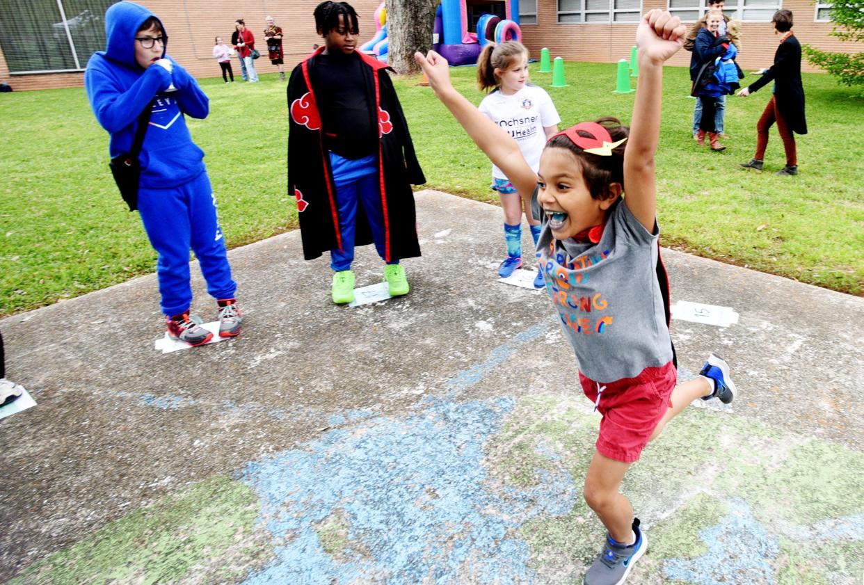 Kingston Hunter reacts when he learns he has won a cake during the North Louisiana Jewish Federation's Purim Carnival at the B'nai Zion Congregation Sunday afternoon, March 24, 2024.