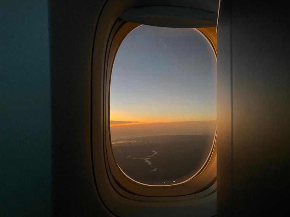 Sunrise from the plane window on British Airways Business Class Club Suite, Paul Oswell, "Review with photos of British Airways' Business Class Club Suite"