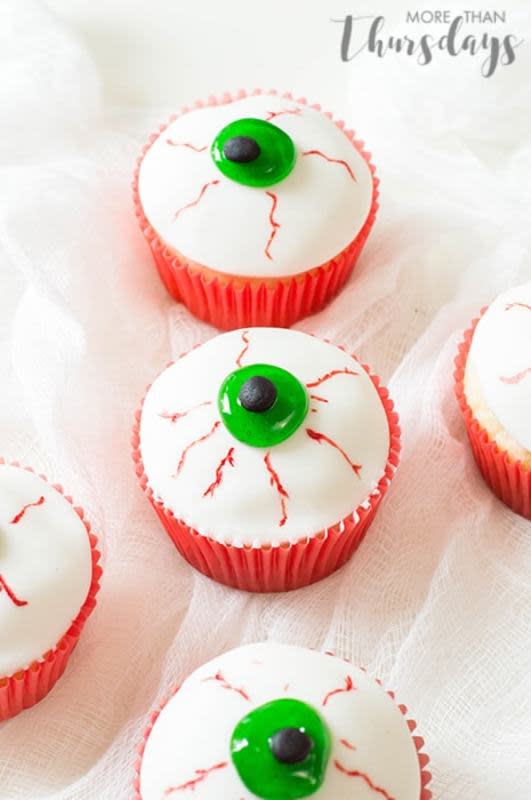 <p>Creepy Eyeball Cupcakes</p><p>The messier and creepier you can decorate these cupcakes, the better!</p><p><strong>Get the recipe: <a href="https://morethanthursdays.com/creepy-eyeball-cupcakes/" rel="nofollow noopener" target="_blank" data-ylk="slk:Creepy Eyeball Cupcakes;elm:context_link;itc:0;sec:content-canvas" class="link ">Creepy Eyeball Cupcakes</a></strong></p>