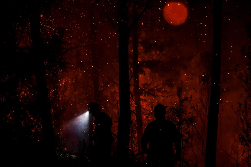 Firefighters tackle a wildfire at Amendoa in Macao, central Portugal on July 21, 2019. (Photo: Patricia De Melo Moreira/AFP/Getty Images)