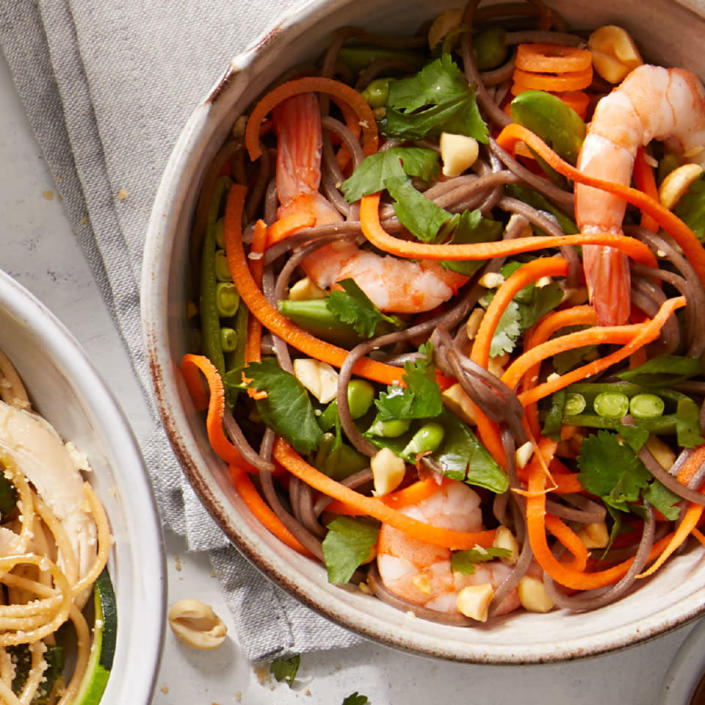 <p>This healthy peanut shrimp noodle recipe comes together in a flash, thanks to cooked shrimp and a handful of crunchy veggies. Look for precooked cocktail shrimp in the seafood section of your grocery store. <a href="https://www.eatingwell.com/recipe/273197/thai-inspired-peanut-shrimp-noodles/" rel="nofollow noopener" target="_blank" data-ylk="slk:View Recipe" class="link rapid-noclick-resp">View Recipe</a></p>