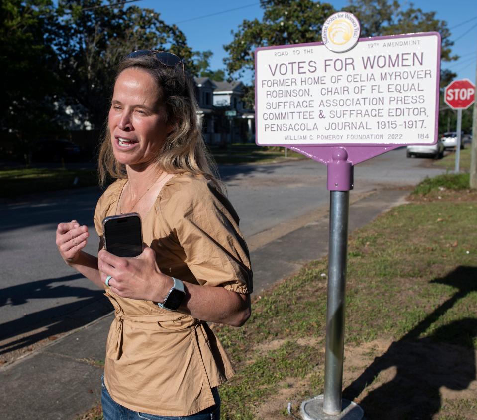 Christine Monlux announces the dedication of a new memorial commemorating the National Votes for Women Trail outside her East Hill home on Monday, April 17, 2023. The landmark designation marks the former East Hill home of the suffragette and Women's Voter activist Celia Myrover Robinson.