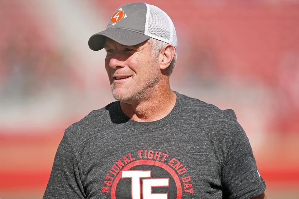 Former NFL quarterback Brett Favre wears a t-shirt that reads "National Tight End Day" prior to the start of an NFL game between the Carolina Panthers and San Francisco 49ers at Levi's Stadium on October 27, 2019 in Santa Clara, California.