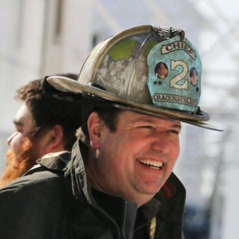 Mackinac Island Fire Chief Jason St. Onge, seen here in 2021, has expressed concern about the safety risk involving e-bike batteries on an island filled with wooden structures. Two fires have been reported within the past two weeks, he said Thursday, May 18, 2023.