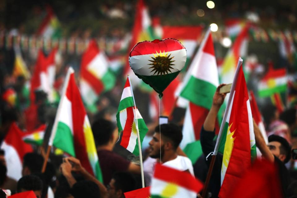 <p>Iraqi Kurds take part in an event to urge people to vote in the upcoming independence referendum in Arbil, the capital of the autonomous Kurdish region of northern Iraq, Sept. 16, 2017. (Photo: Safin Hamed/AFP/Getty Images) </p>