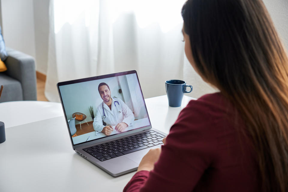 Woman having a telehealth appointment with doctor