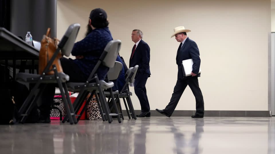 Jesse Prado arrives to share his findings at a special city council meeting in Uvalde on Thursday. - Eric Gay/AP