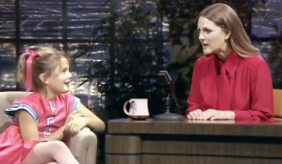 Drew Barrymore interviews her younger self in a "Drew Barrymore Show" promo clip