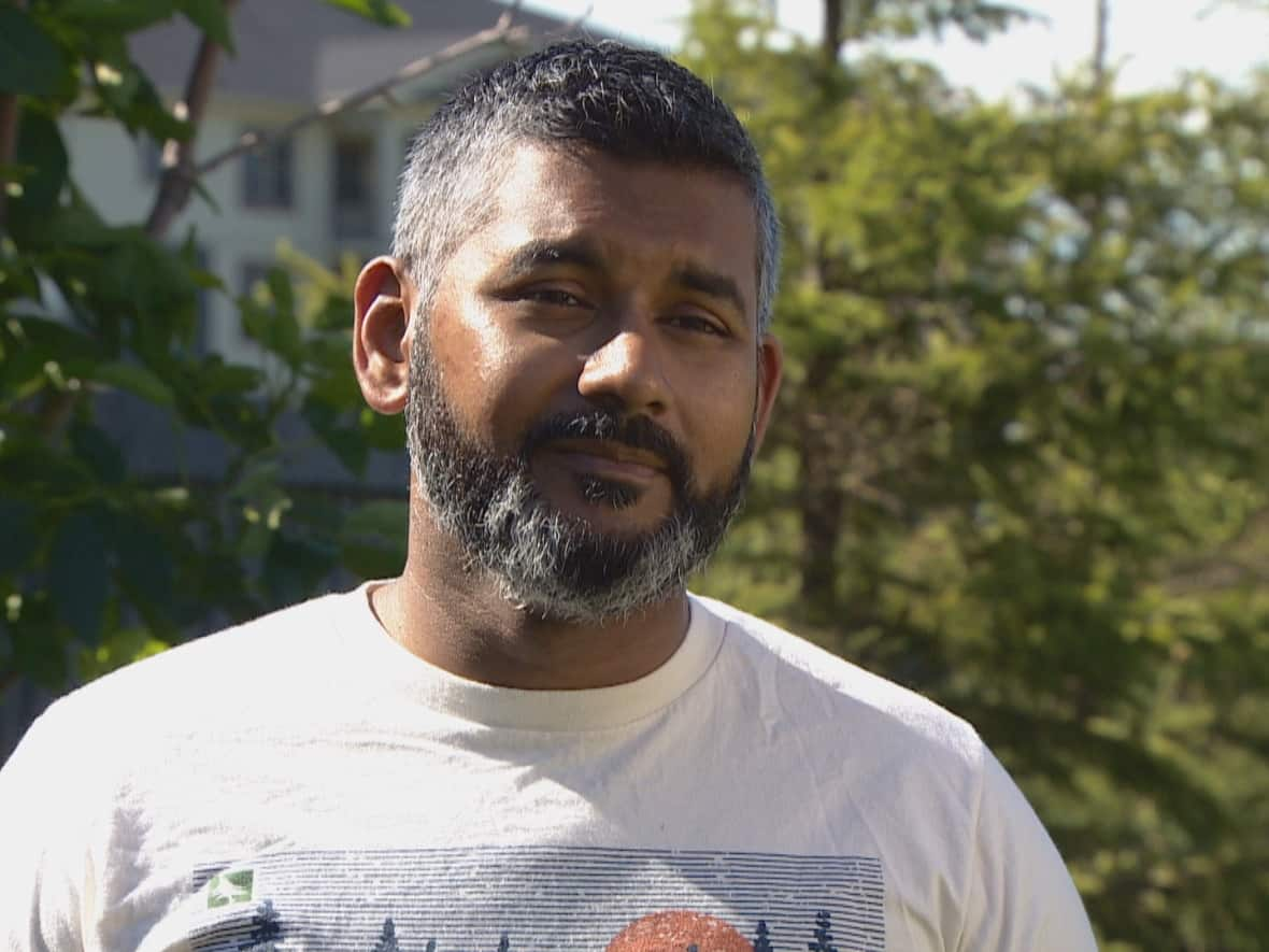 Mohammed Hussain has three children who play on hockey teams. 'It takes a chunk out of your paycheque,' the Edmonton father says. (Trevor Wilson/CBC - image credit)