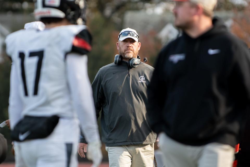 Germantown Academy head coach Matt Dence looks on during Saturday's game against Penn Charter.