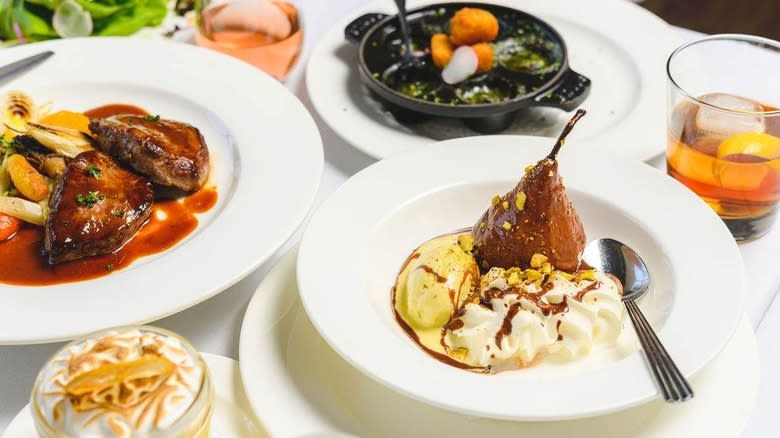 Plates on table with food