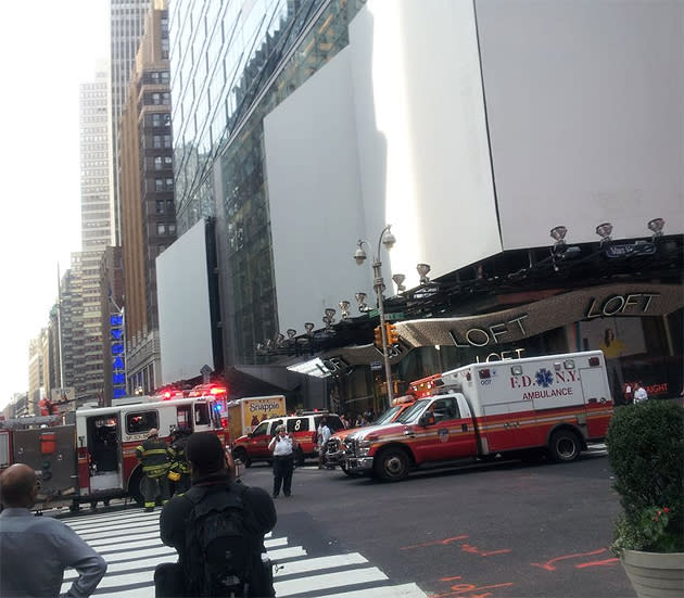 Firemen and EMS tend to the scene after a gunman opened fire outside of New York's Empire State Building. Twitter photo courtesy of Shiviaka Sinha (@shivikasinha)
