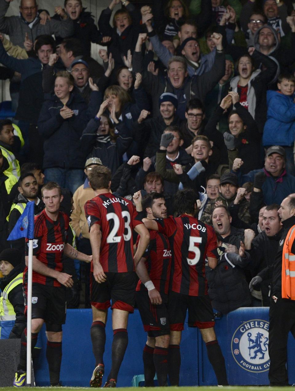 West Bromwich Albion's Shane Long (2nd R) celebrates with team mates after scoring against Chelsea during their English Premier League soccer match at Stamford Bridge in London November 9, 2013.