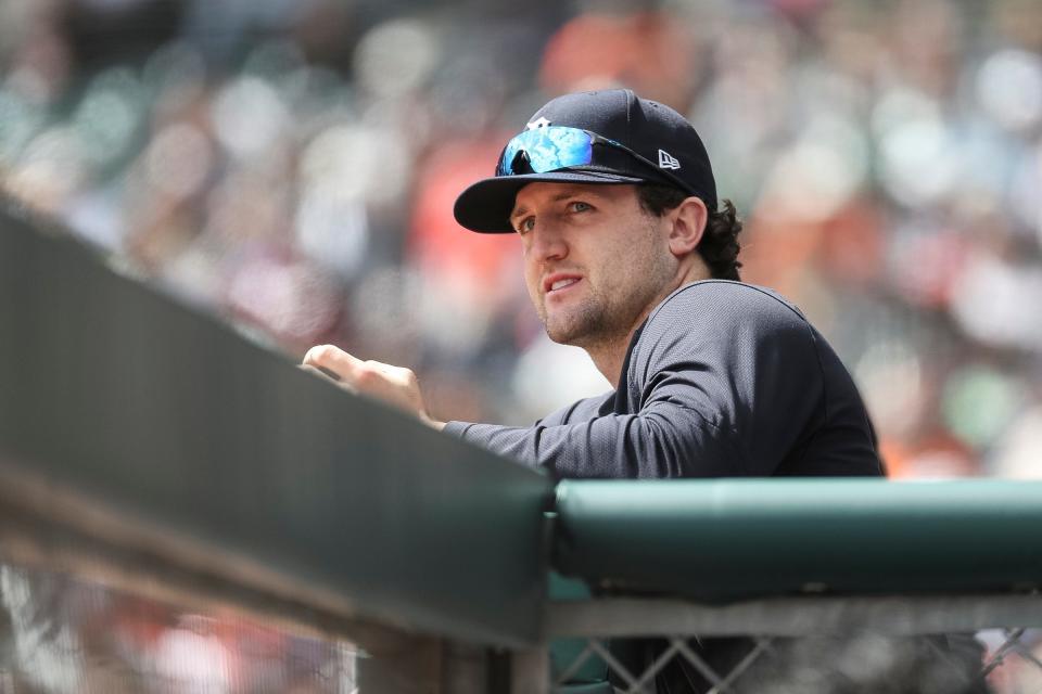 Detroit Tigers pitcher Casey Mize watches a play against New York Mets from the dugout during the ninth inning at Comerica Park in Detroit on Thursday, May 4, 2023.