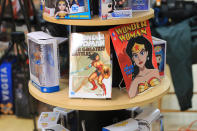 <p>Action figures and book featuring Wonder Woman on display at the Midtown Comics in New York City. (Gordon Donovan/Yahoo News) </p>