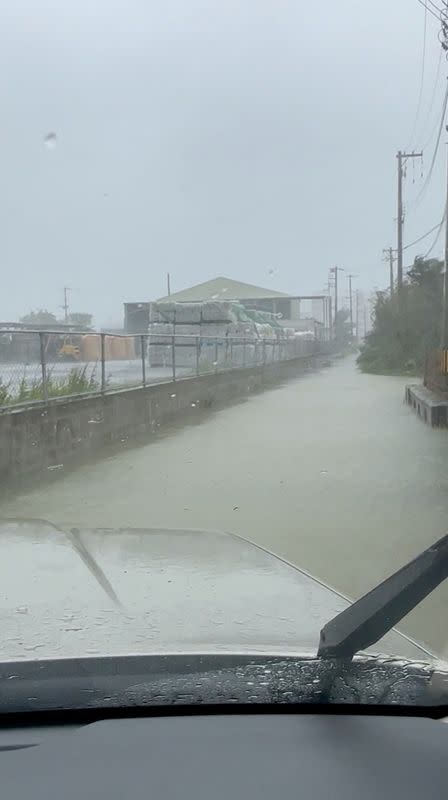 A view shows flooded road following typhoon Khanun in Nago