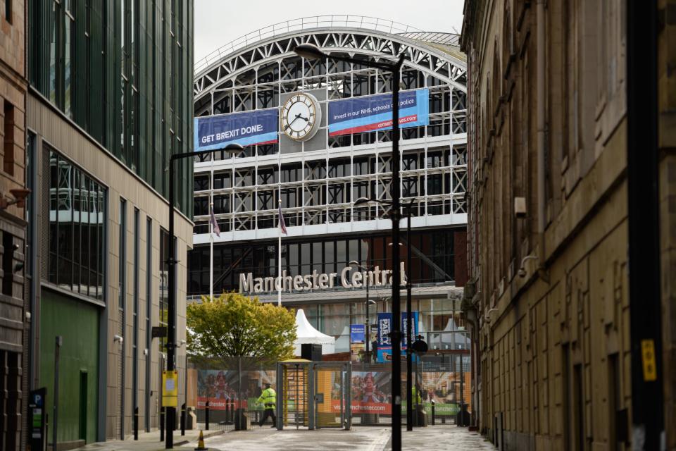 Police patrol outside the Manchester Central convention centre, the venue of the annual Conservative Party conference, in Manchester, northwest England on September 28, 2019 on the eve of the start of the conference. - Embattled British Prime Minister Boris Johnson gathers his Conservative party Sunday for what could be its final conference before an election, and is set to be dominated by fighting talk on Brexit. (Photo by OLI SCARFF / AFP)        (Photo credit should read OLI SCARFF/AFP/Getty Images)