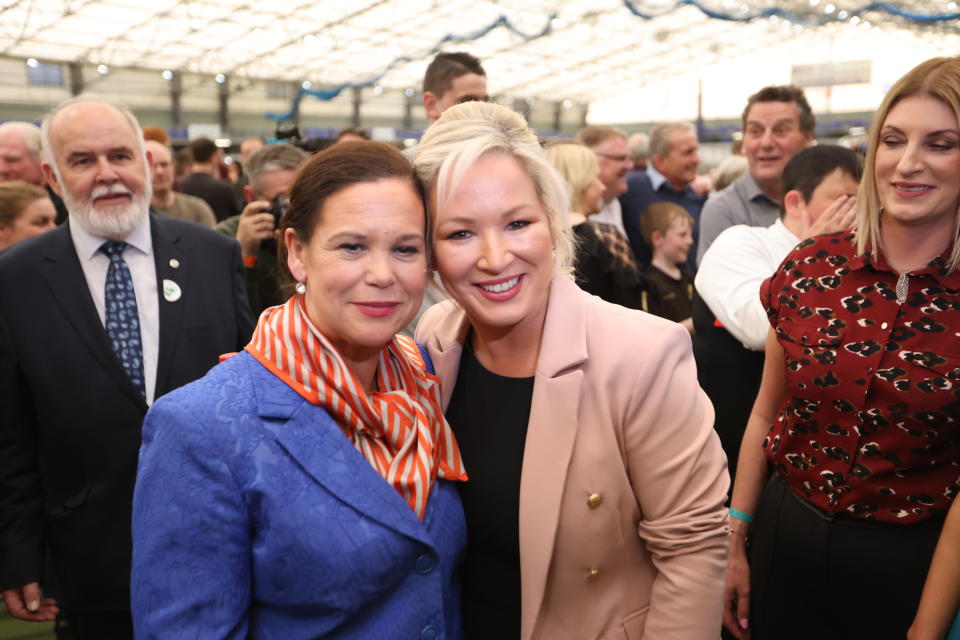 Sinn Fein's Michelle O'Neill, right, and party leader Mary Lou McDonald after Sinn Fein topped the poll at the Medow Bank election count centre on Saturday, May, 7, 2022, in Magherafelt , Northern Ireland. (AP Photo/Peter Morrison)