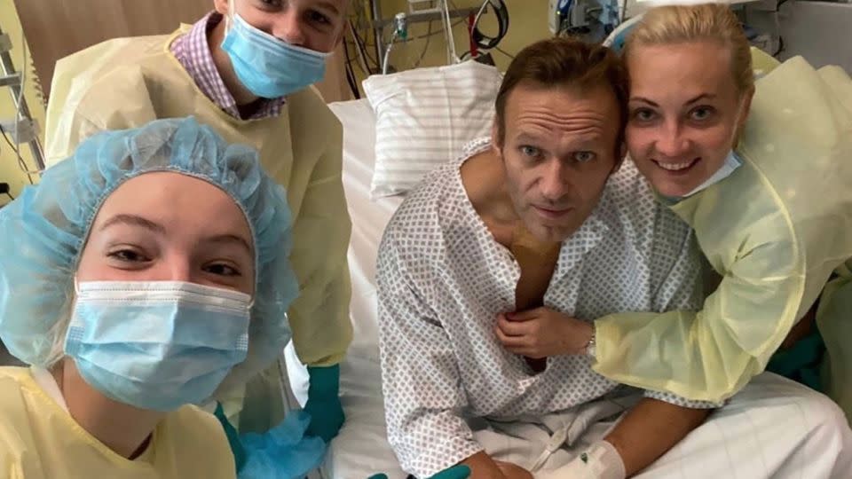 A photo shared on Navalny's instagram account shows the Russian opposition leader in a hospital bed surrounded by his wife and two children as his treatment continues following Novichok poisoning in 2020. - Alexey Navalny/Instagram/Anadolu/Getty Images