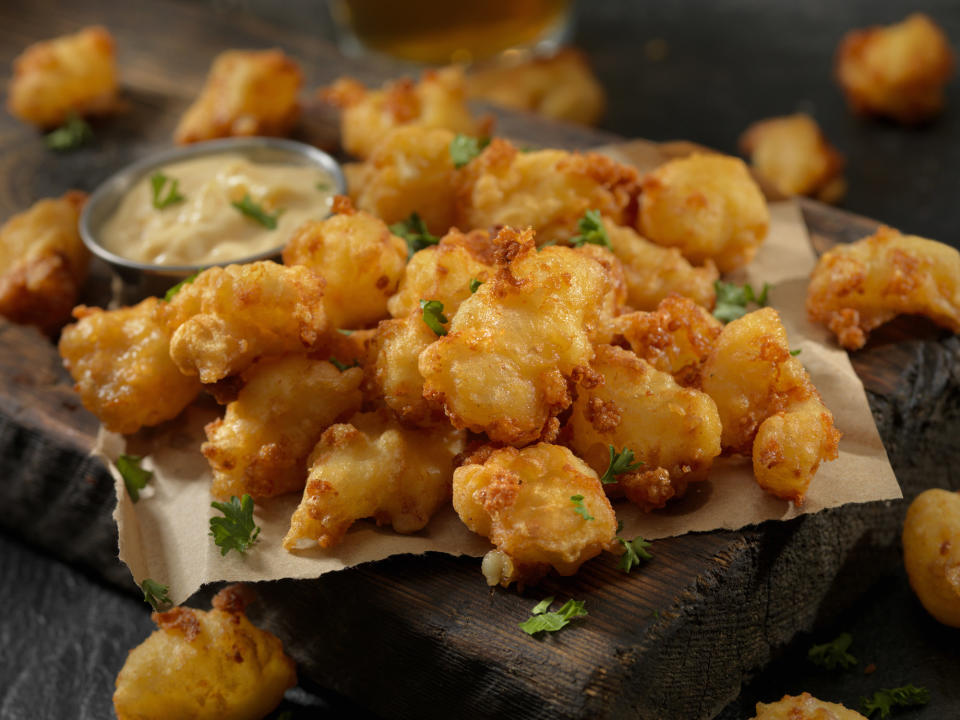 <div><p>"Fried cheese curds were the absolute worst. Find the big chunks, toss them in flour, toss them in batter...then ONE BY ONE swim each damn piece into the fryer. Annoying AF."</p><p>—<a href="https://www.reddit.com/user/hrspryqn/" rel="nofollow noopener" target="_blank" data-ylk="slk:u/hrspryqn;elm:context_link;itc:0;sec:content-canvas" class="link ">u/hrspryqn</a></p></div><span> Lauripatterson / Getty Images</span>